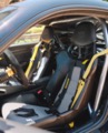 Custom Porsche cockpit with roll cage and trimmed panels